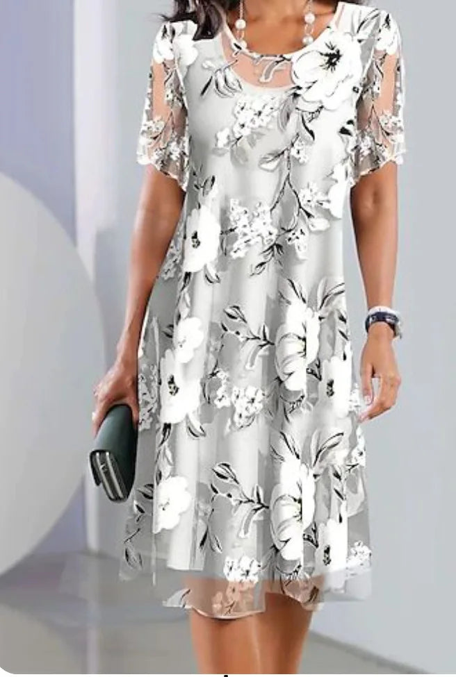 Emma - Vestido con Transparencias y Estampado Floral